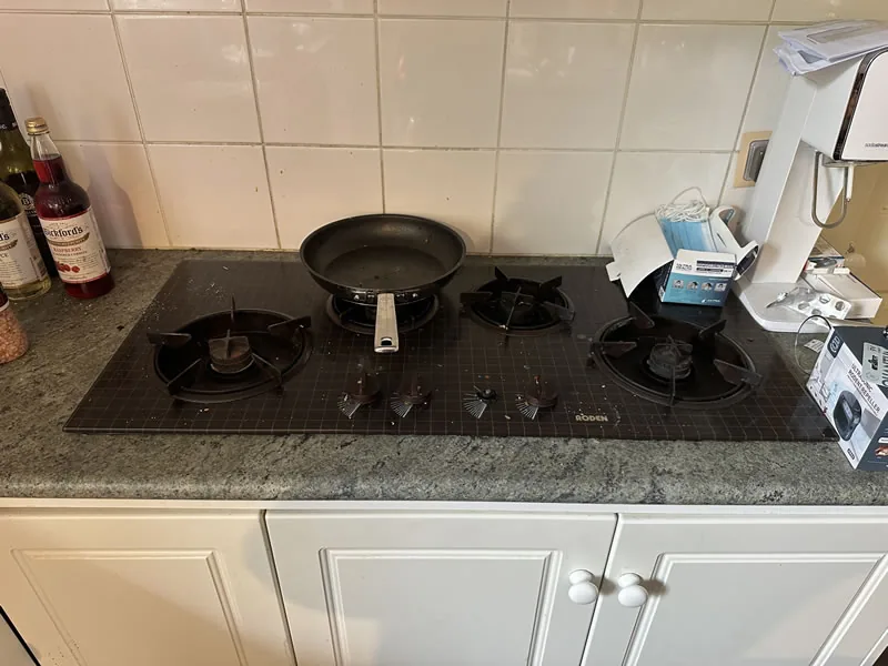 Gas stove and cooktop before cleaning